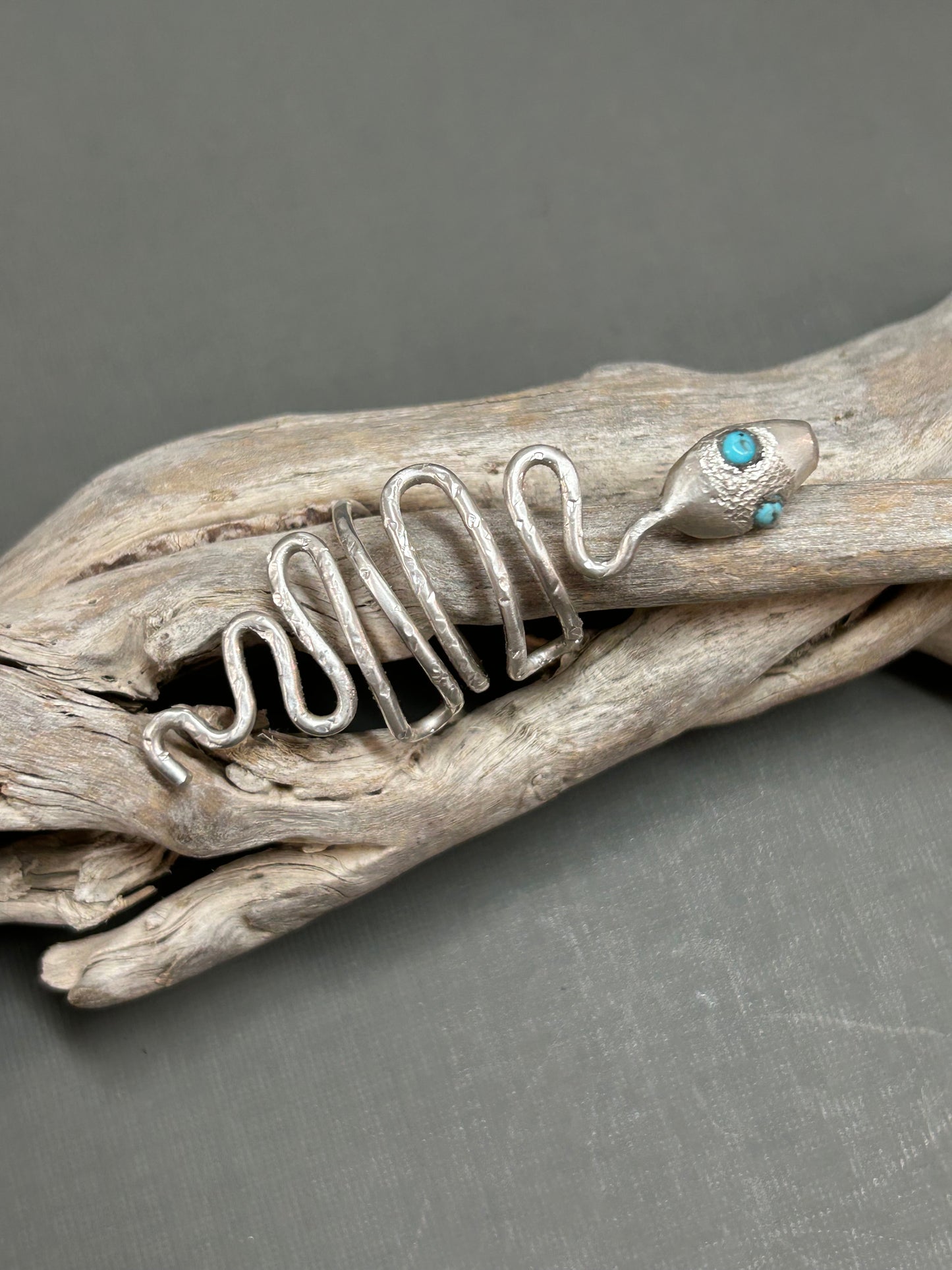Snake ring wiggly silver snake with turquoise eyes