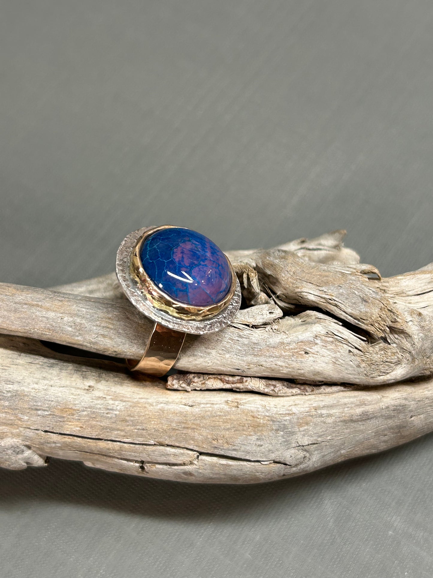 Blue gold and silver ring