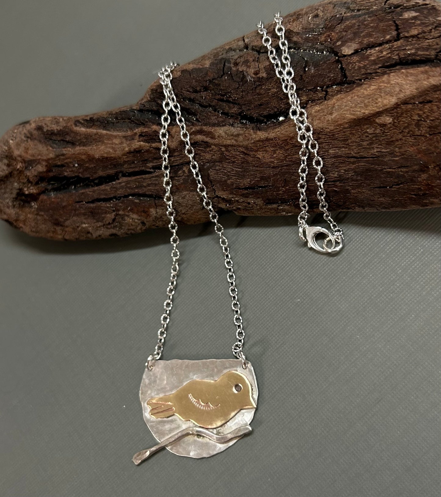 Bird on a branch necklace