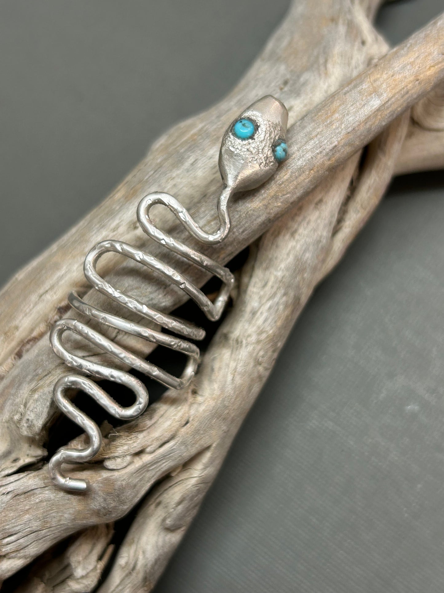 Snake ring wiggly silver snake with turquoise eyes