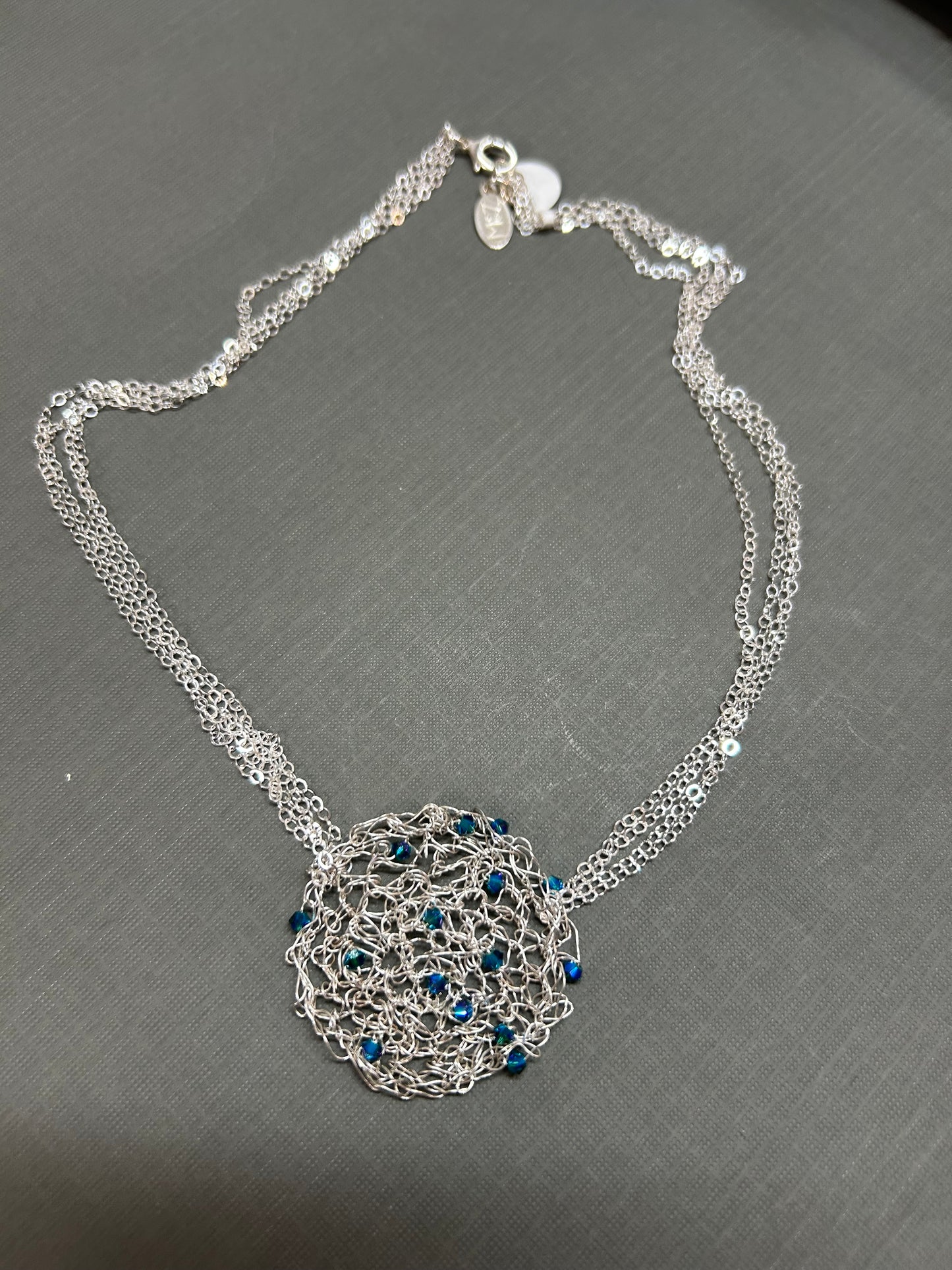 Crystals on silver mesh necklace