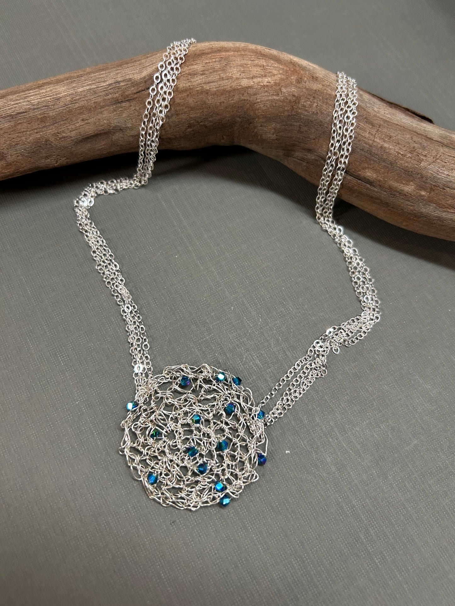 Crystals on silver mesh necklace