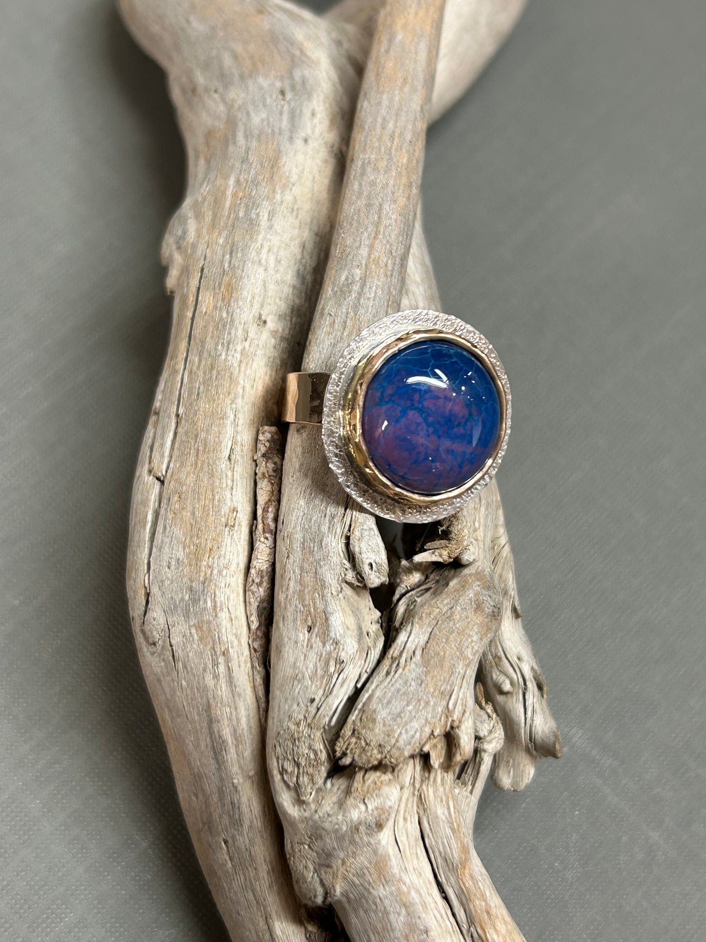 Blue gold and silver ring