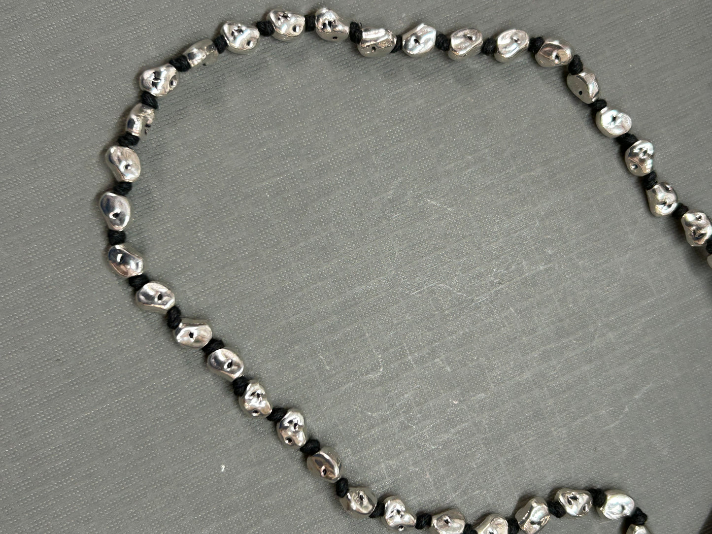 Silver nuggets knotted necklace