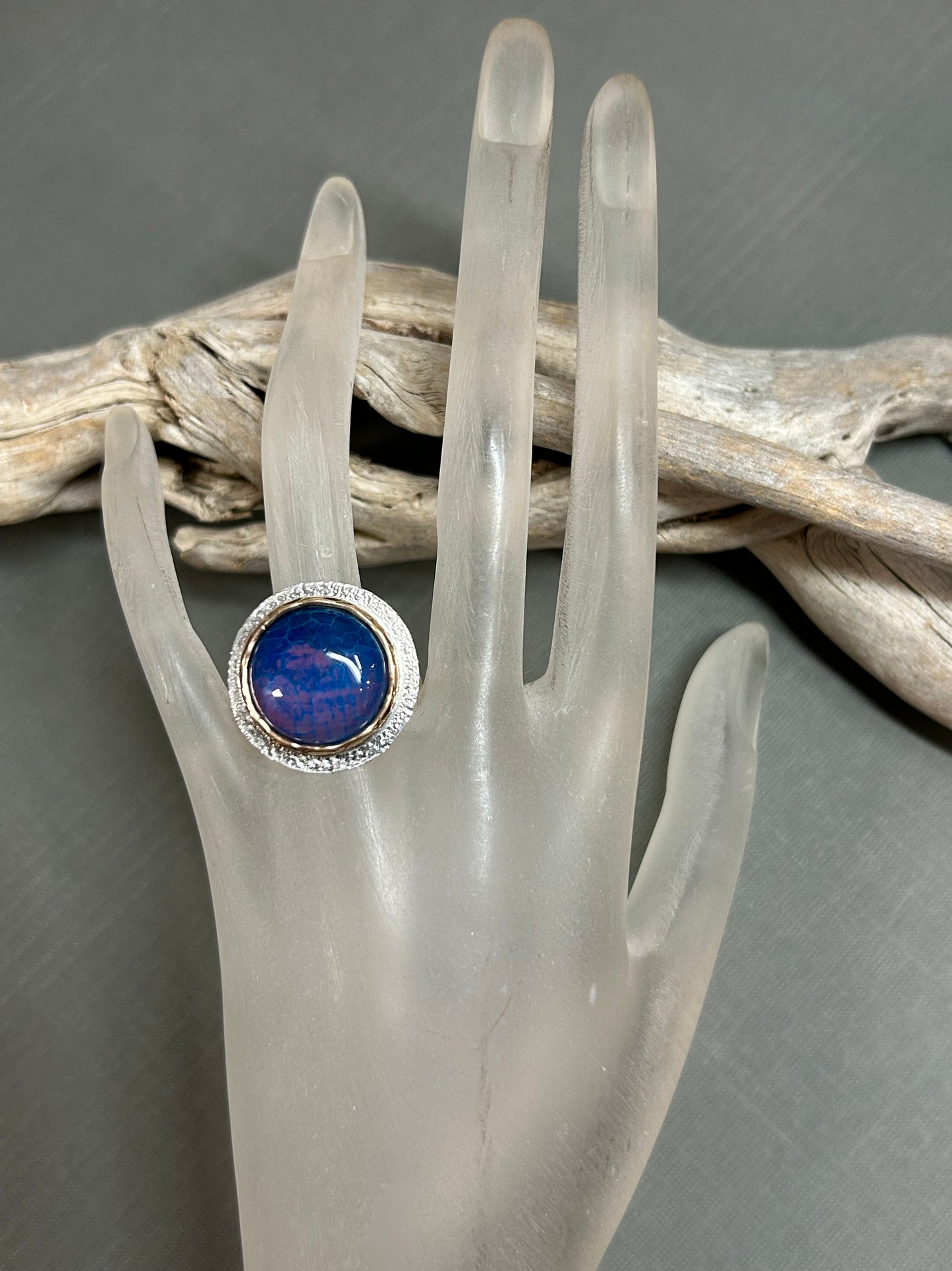 Blue gold and silver ring