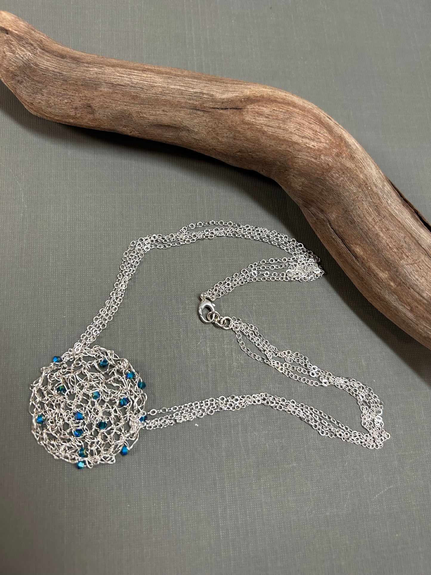 Crystals on silver mesh necklace