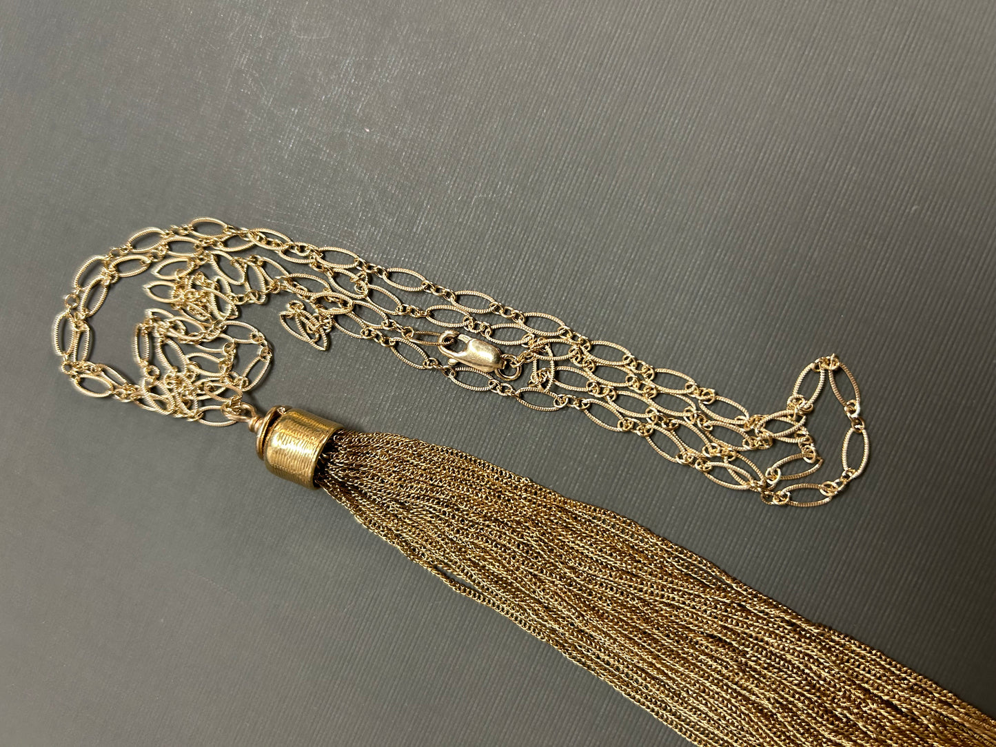 Tassel gold neck