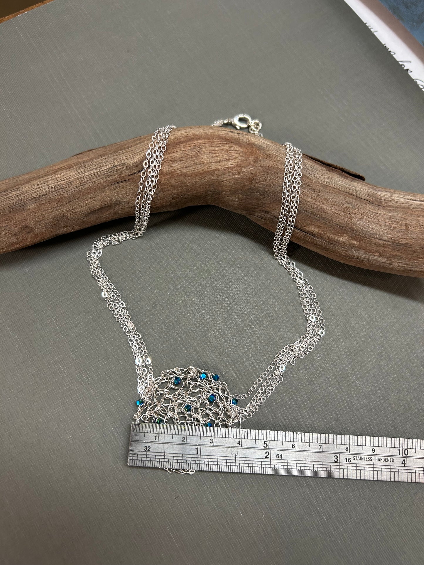 Crystals on silver mesh necklace
