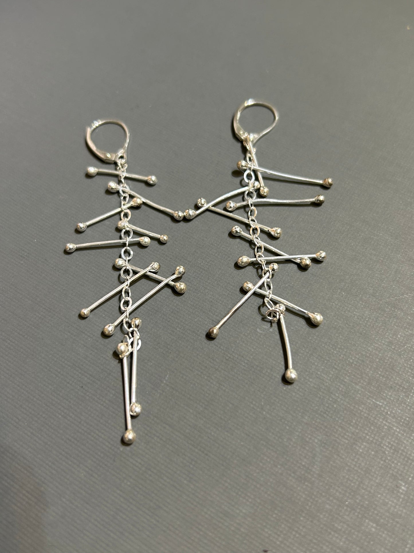 Kinetic silver earrings