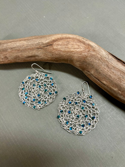 Crochet circle earrings with blue crystals