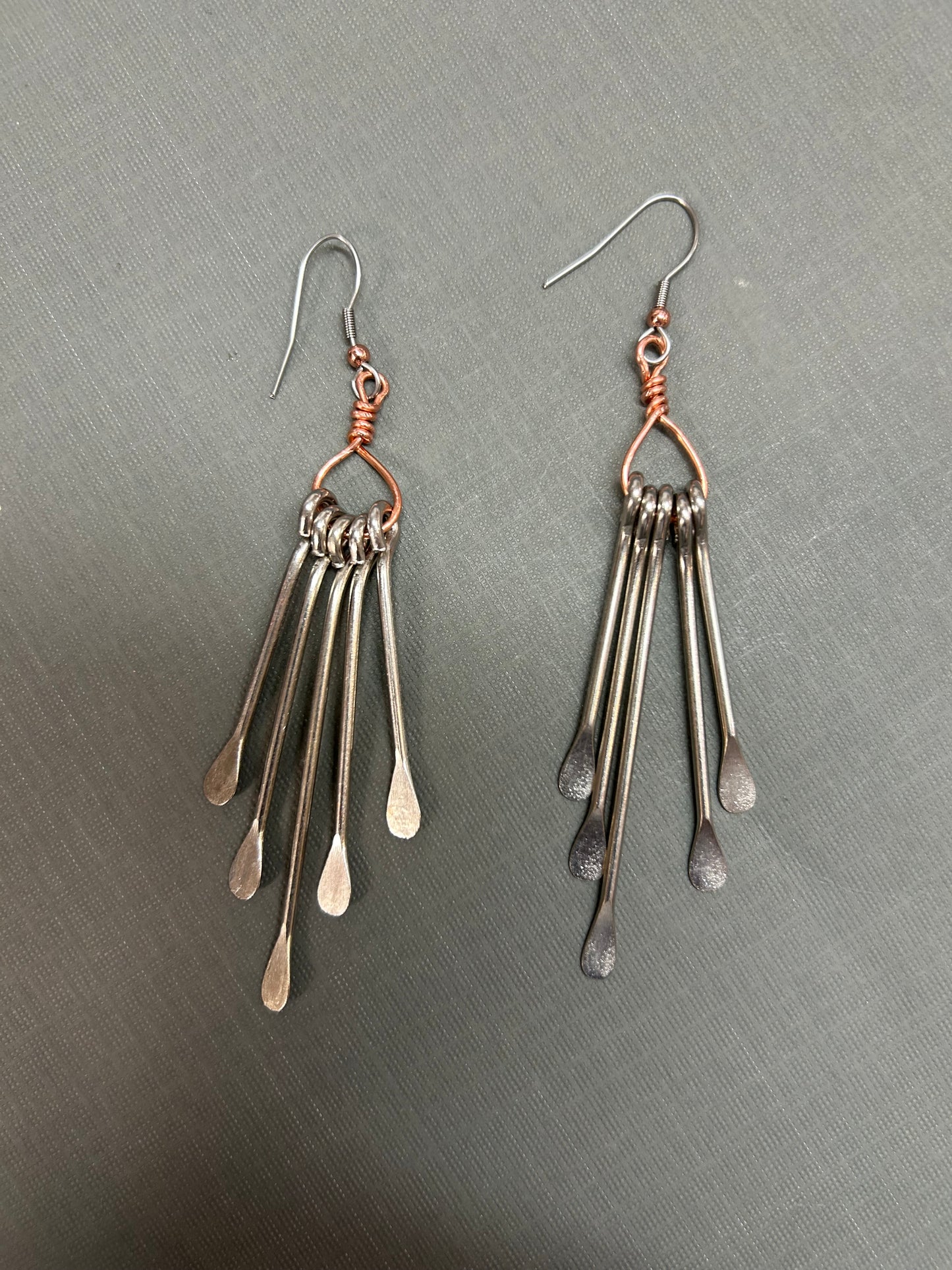 Long pedal dangle earrings