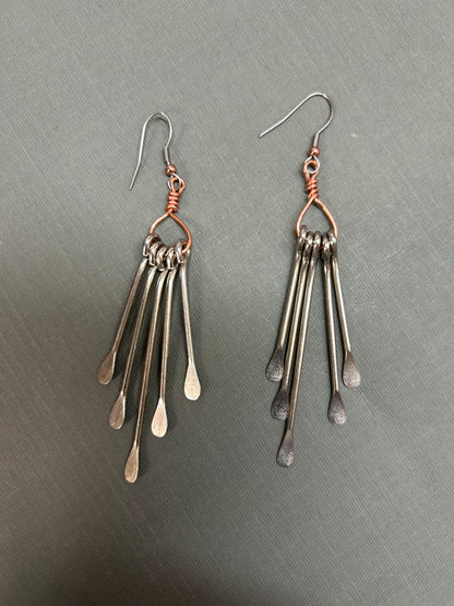 Long pedal dangle earrings
