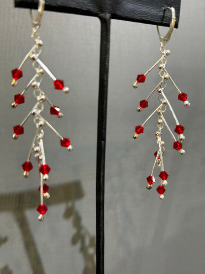 Kinetic earrings silver and red crystals