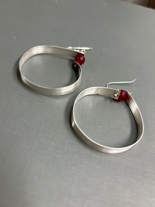 Wide silver hoops with gemstone