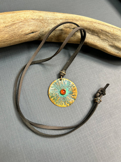 Copper  and carnelian pendant on leather