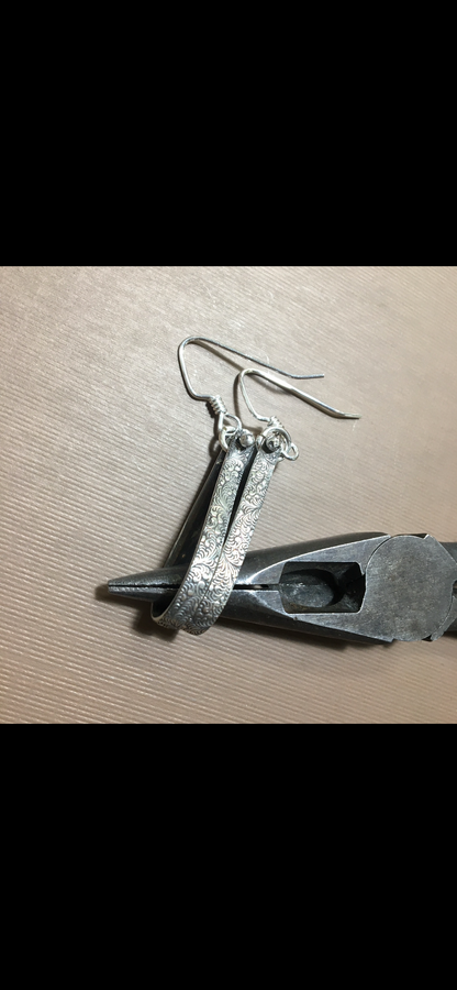 Long hoop textured earrings