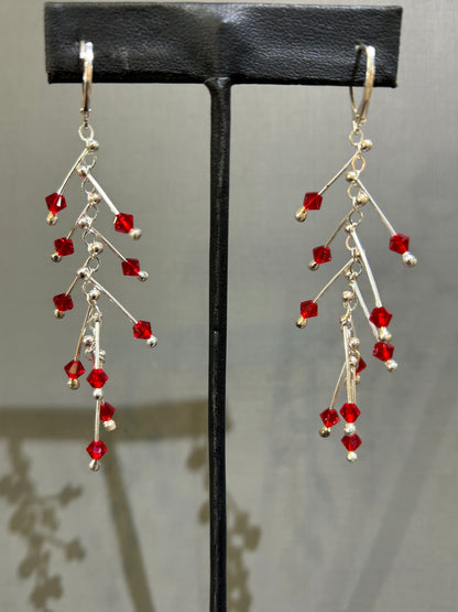 Kinetic earrings silver and red crystals