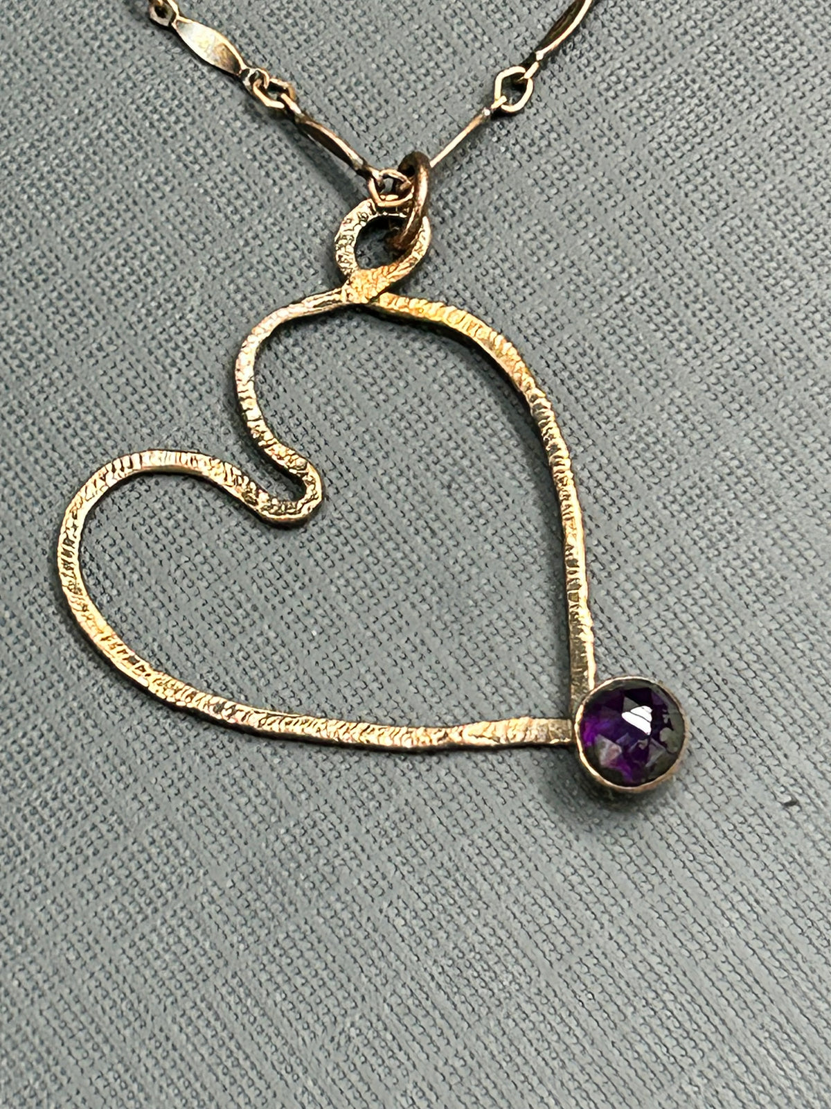 Copper heart in purple