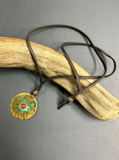 Copper  and carnelian pendant on leather