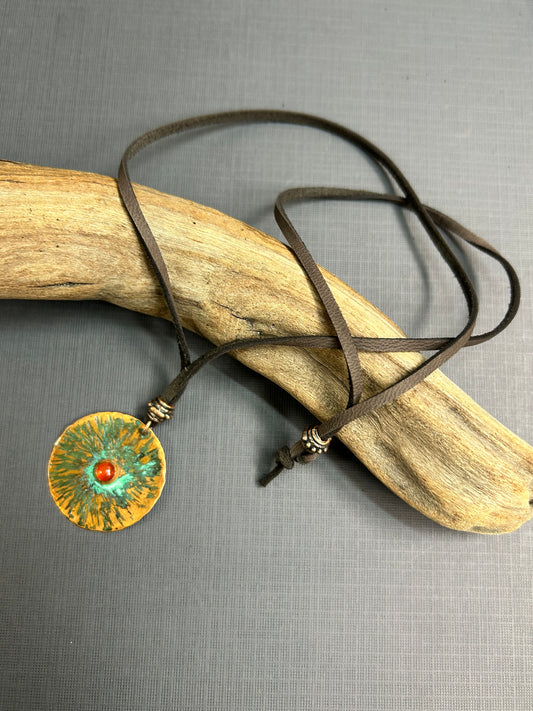 Copper  and carnelian pendant on leather