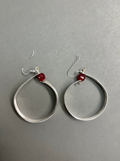 Wide silver hoops with gemstone