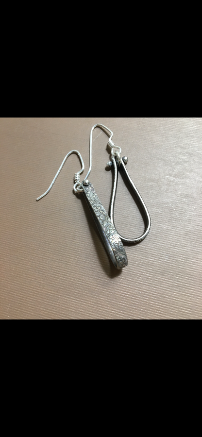 Long hoop textured earrings