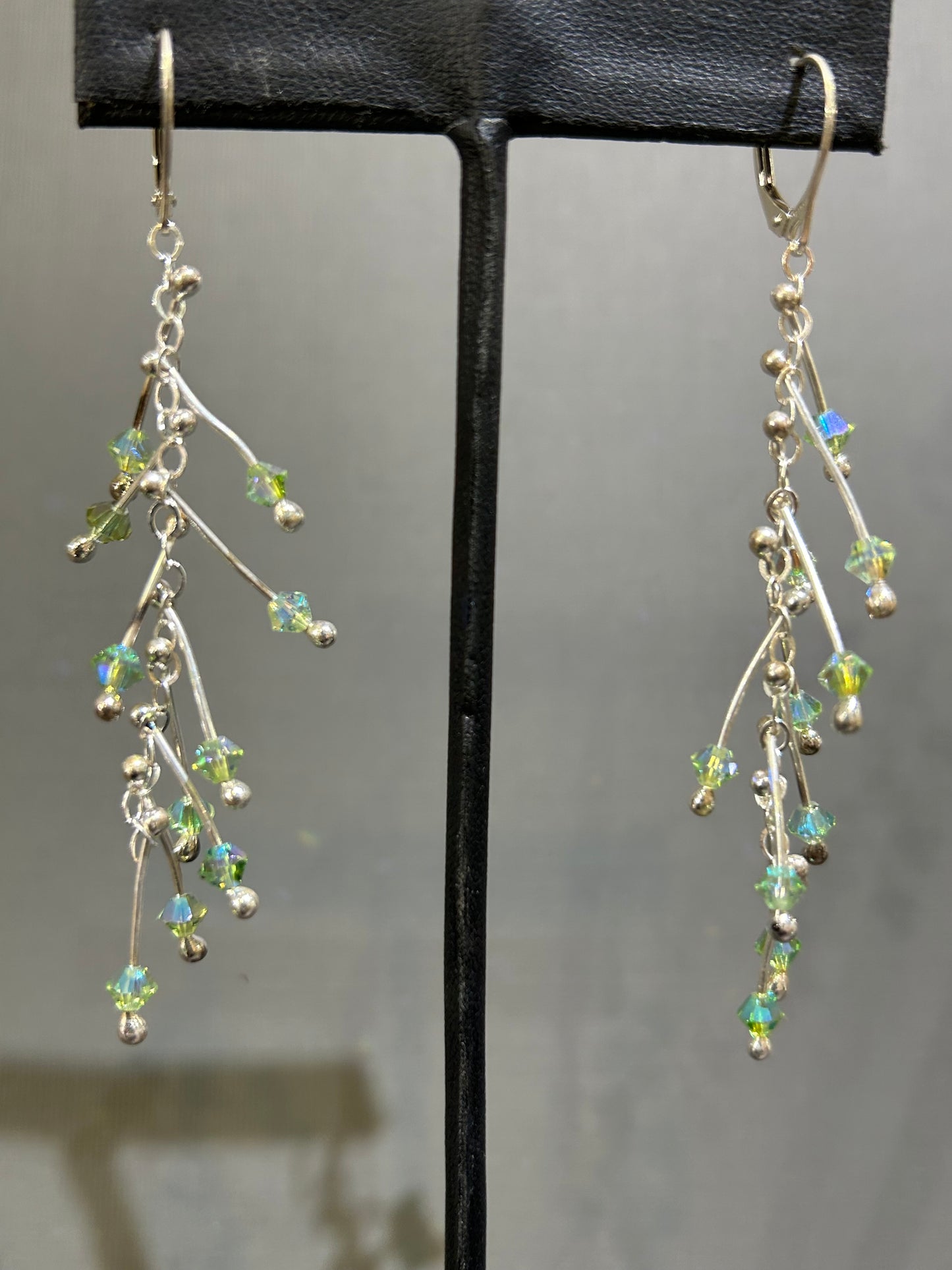 Kinetic Earrings Silver and green crystals