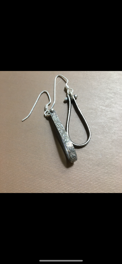 Long hoop textured earrings