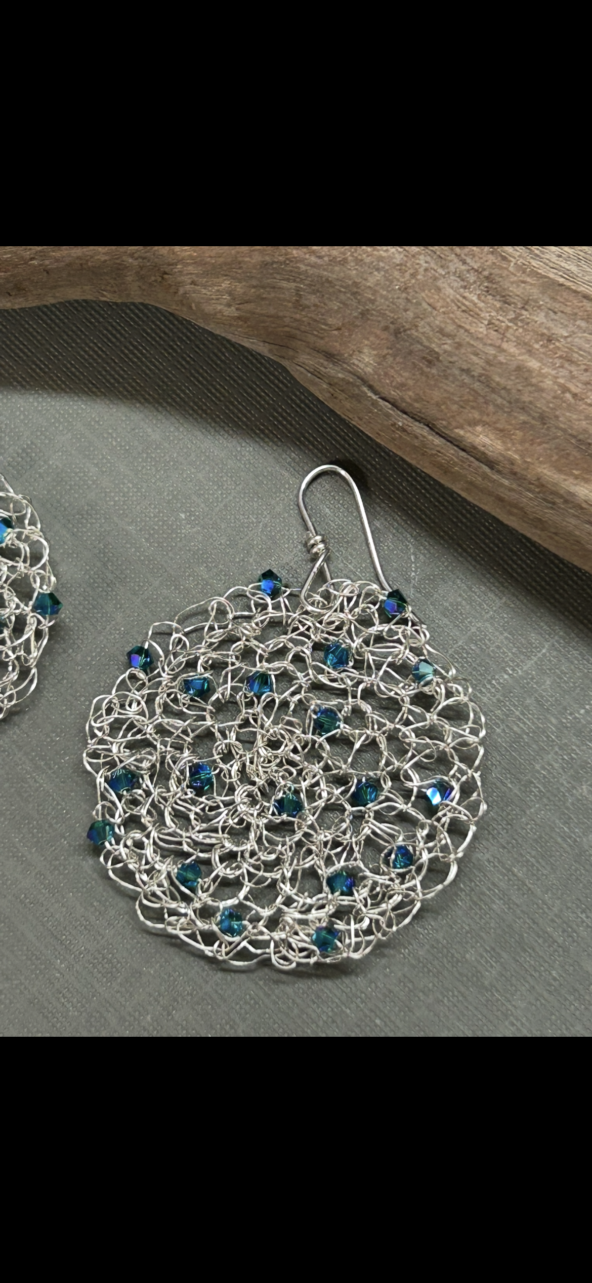 Crochet circle earrings with blue crystals