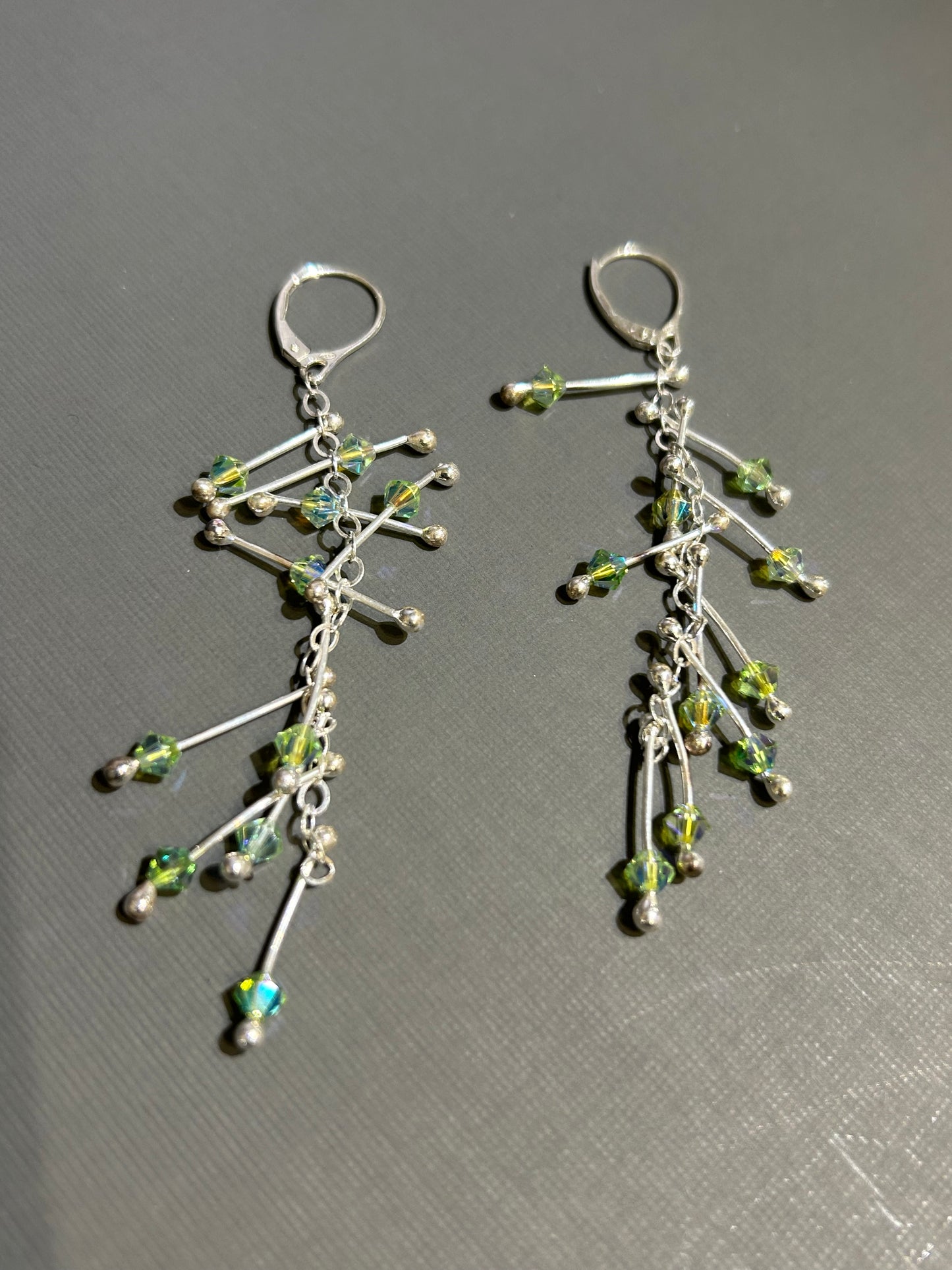 Kinetic Earrings Silver and green crystals