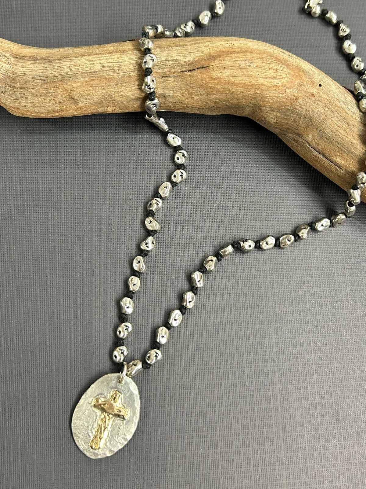Silver and gold cross necklace