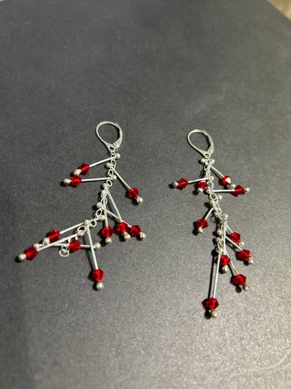 Kinetic earrings silver and red crystals