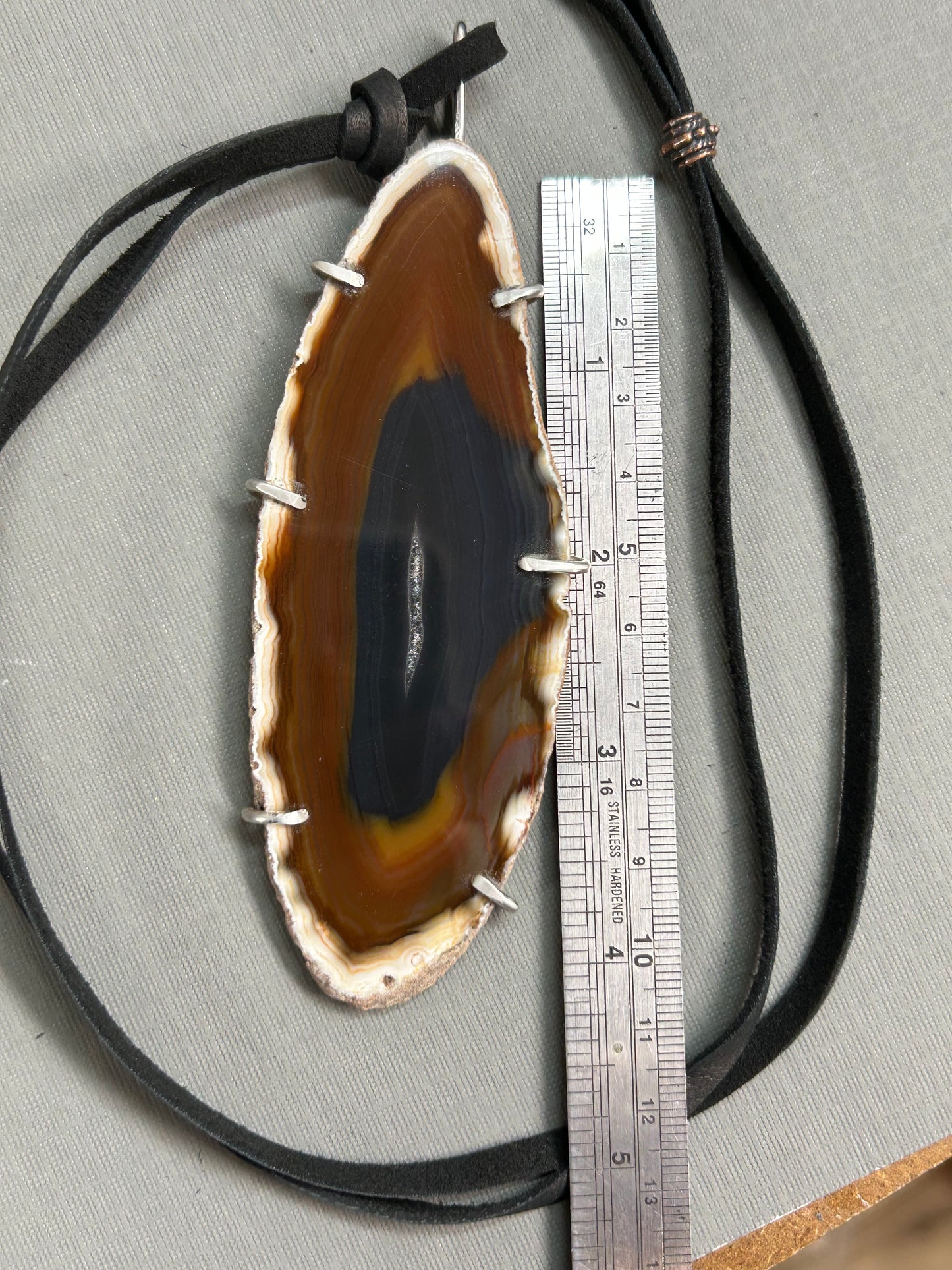 Agate gemstone on leather